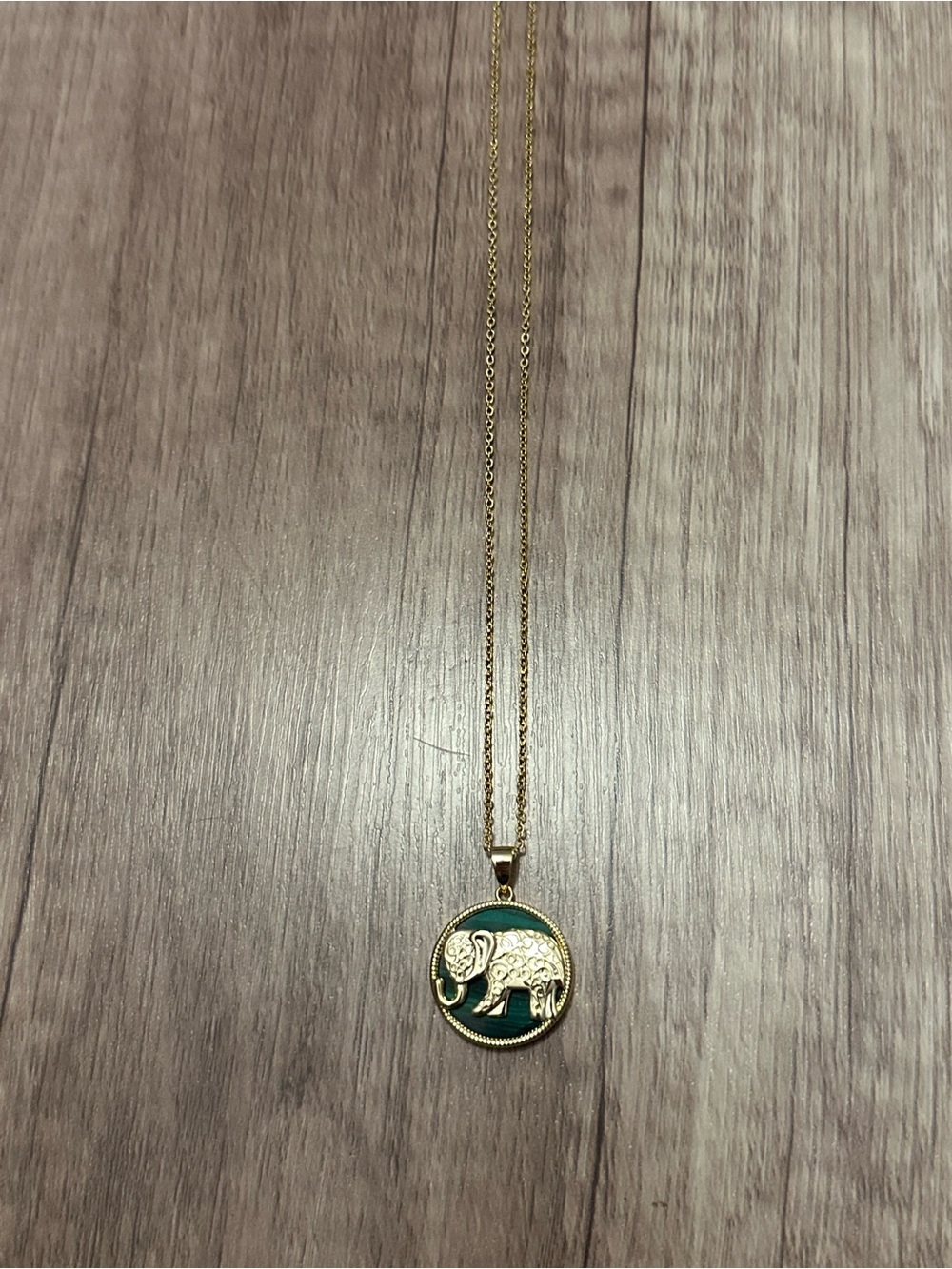 Gold Elephant Pendant Necklace with Green Enamel
